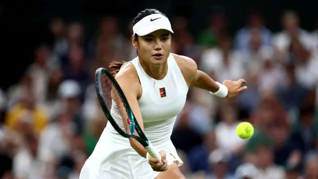 Emma Raducanu of Great Britain plays a forehand