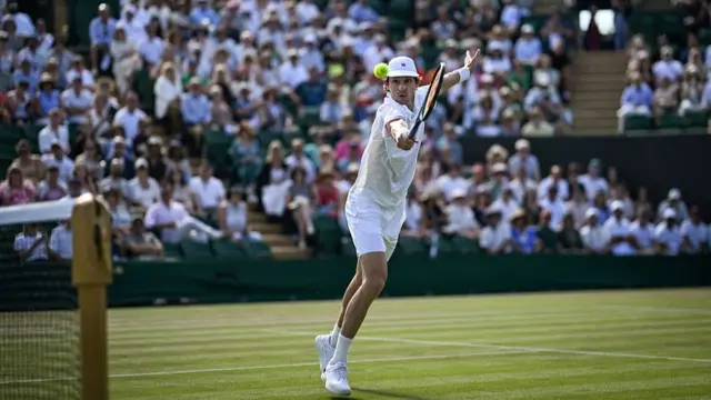 Nicolas Jarry plays a backhand return