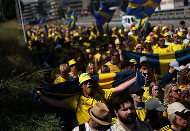 Sweden fans on their way to the game