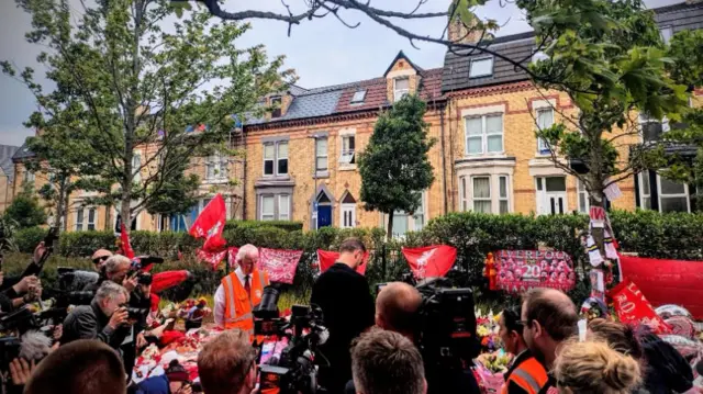 Press stood behind Jordan Henderson as he pays his respects