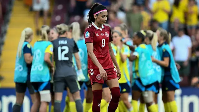 Denmark's forward #09 Nadia Nadim reacts at the end of the UEFA Women's Euro 2025 Group C football match between Denmark and Sweden at the Stade de Geneve in Geneva