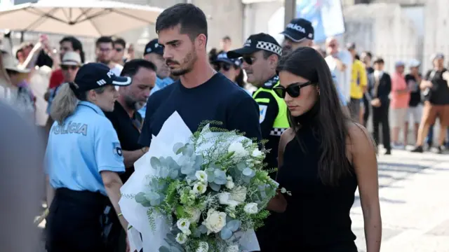 Portugal and RB Leipzig player Andre Silva and his partner Maria Rodrigues arrive at the wake of Diogo Jota being held at Sao Cosme Chapel in the town of Gondomar near Porto.