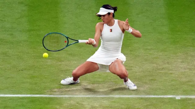 Emma Raducanu plays a forehand