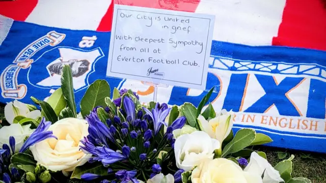 Message on wreath saying Our City is United in grief. With deepest sympathy from all at Everton