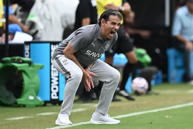 Simone Inzaghi looks angry on the touchline