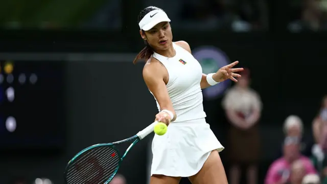 Emma Raducanu plays a forehand