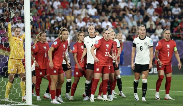 General view as players from both teams look on before a corner kick