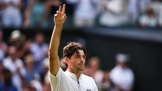 Taylor Fritz celebrates