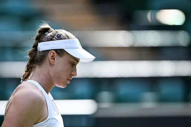 Elena Rybakina looks on at Wimbledon