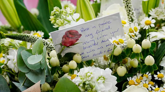 Rest in peace friend - card on flowers laid by Jordan Henderson at Anfield