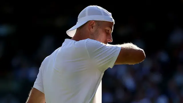 Jan-Lennard Struff of Germany reacts