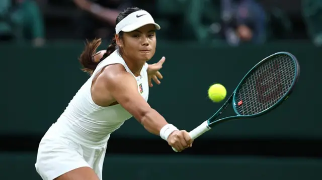 Emma Raducanu plays a backhand
