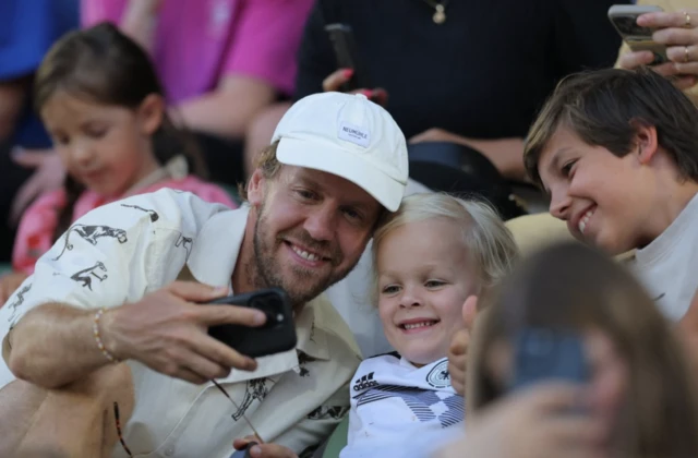 Sebastian Vettel poses for a picture
