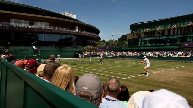 A general view as Henry Patten and Harri Heliovaara take on Billy Harris and Marcus Willis