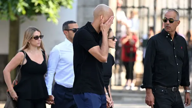 Fabinho rubs his eyes