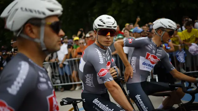 Jasper Philipsen with Alpecin-Deceuninck team-mates before the start of the 2025 Tour de France