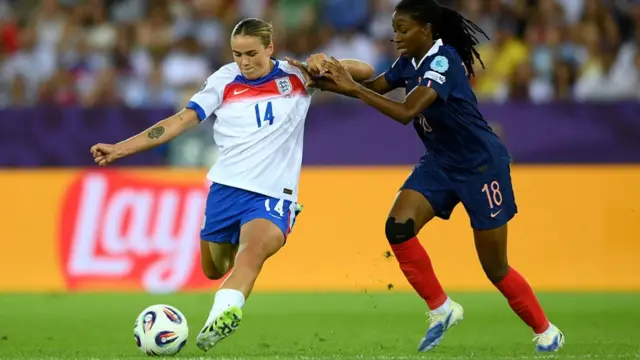 Grace Clinton of England is put under pressure by Oriane Jean-Francois of France during the UEFA Women's EURO 2025 Group D match between France and England