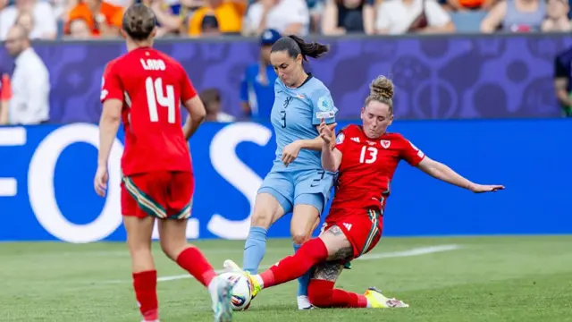 Caitlin Dijkstra of Holland Women, Rachel Rowe of Wales Women during the EURO Women match between Wales Women v Holland Women at the Allmend Stadium