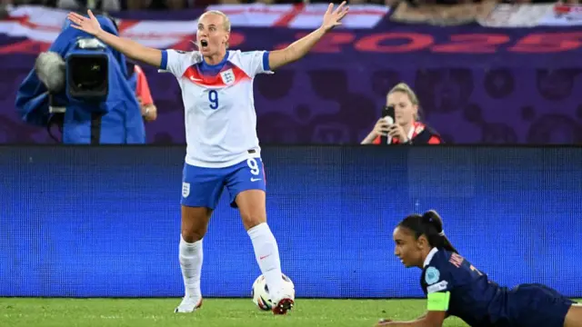 England's forward #09 Beth Mead reacts after a referee's decision next to France's midfielder #07 Sakina Karchaoui during the UEFA Women's Euro 2025 Group D football match between France and England