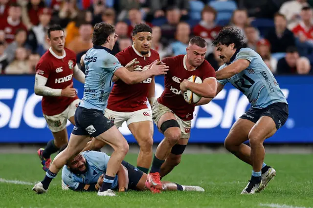 Ben Earl of the British and Irish Lions takes on the defence