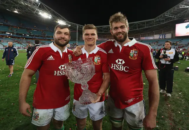 Owen Farrell holding trophy