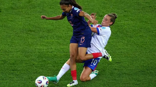 Selma Bacha of France is challenged by Ella Toone of England during the UEFA Women's EURO 2025 Group D match between France and England at Stadion Letzigrund