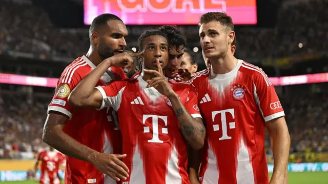 Michael Olise celebrates scoring