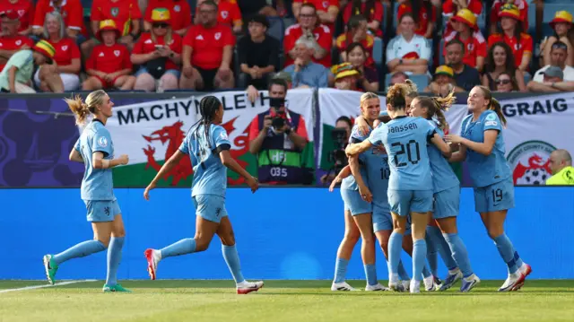 Netherlands' Victoria Pelova celebrates scoring their second goal with teammates