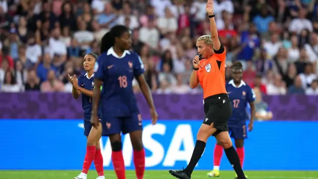 Referee Tess Olofsson gestures to disallow the goal of Alessia Russo of England (not pictured) following a VAR review during the UEFA Women's EURO 2025 Group D match between France and England