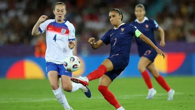 Sakina Karchaoui of France controls the ball whilst under pressure from Keira Walsh of England during the UEFA Women's EURO 2025 Group D match between France and England
