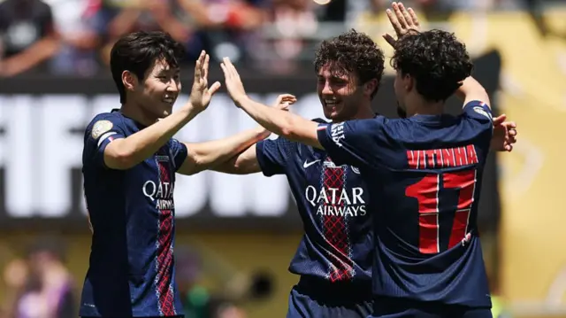 Vitinha, Lee Kang-in and Joao Neves of Paris Saint-Germain celebrate