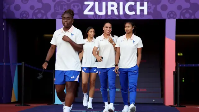 Sandy Baltimore, Delphine Cascarino, Amel Majri and Alice Sombath of France inspect the pitch prior to the UEFA Women's EURO 2025 Group D match between France and England