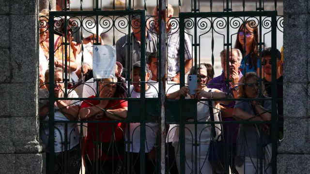 People gather outside church
