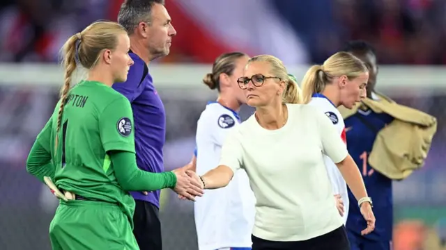 England coach Sarina Wiegman and England goalkeeper Hannah Hampton afterward disappointed during the European Championship Group D match between France and England at Stadion Letzigrund in Zurich,