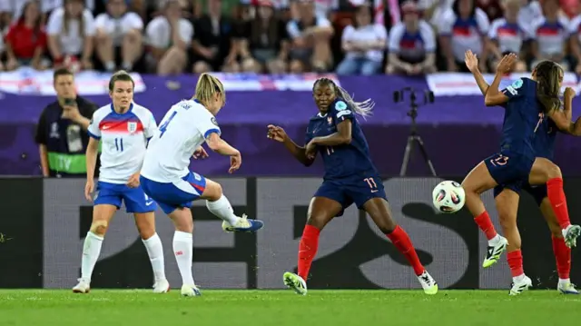 Keira Walsh of England celebrates scoring her team's first goal under pressure from Selma Bacha of France during the UEFA Women's EURO 2025 Group D match between France and England