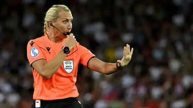 Swedish referee Tess Olofsson blows her whistle during the UEFA Women's Euro 2025 Group D football match between France and England at the Letzigrund Stadium in Zurich