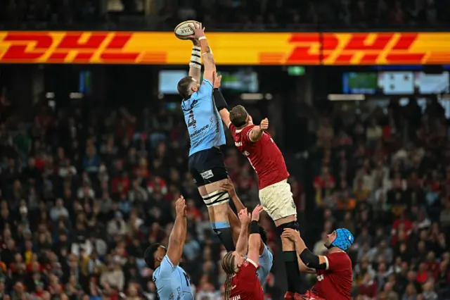 Waratahs' Fergus Lee-Warner (L, top) wins a lineout