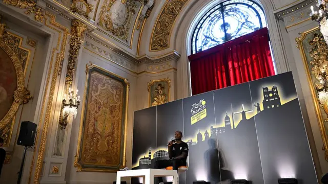 Biniam Girmay speaks at the Lille Opera House before the 2025 Tour de France