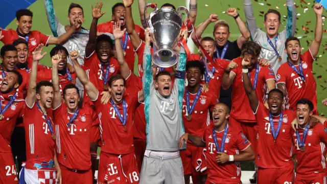 Manuel Neuer, captain of FC Bayern Munich lifts the UEFA Champions League Trophy following his team's victory in the UEFA Champions League Final match between Paris Saint-Germain and Bayern Munich