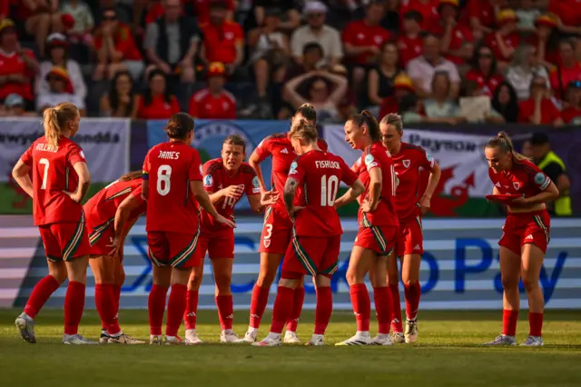 Wales players in a huddle