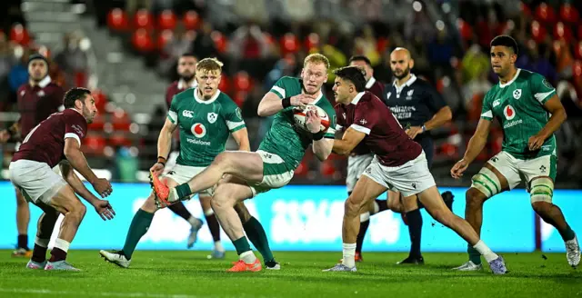 Jamie Osborne battles for the ball