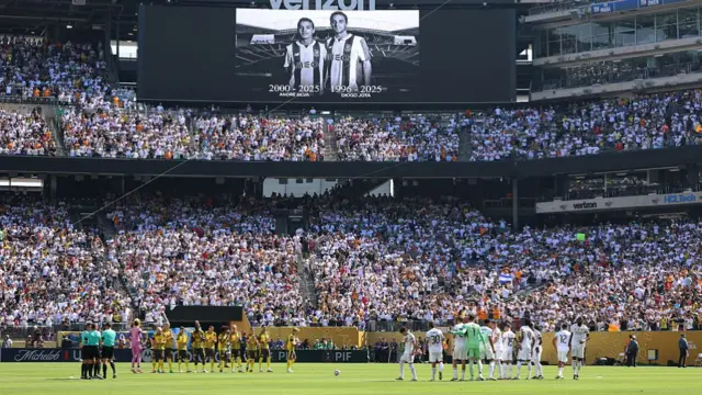 Real Madrid and Borussia Dortmund players observe a minute of silence to pay tribute to Liverpool Portuguese forward Diogo Jota and his brother Andre Silva