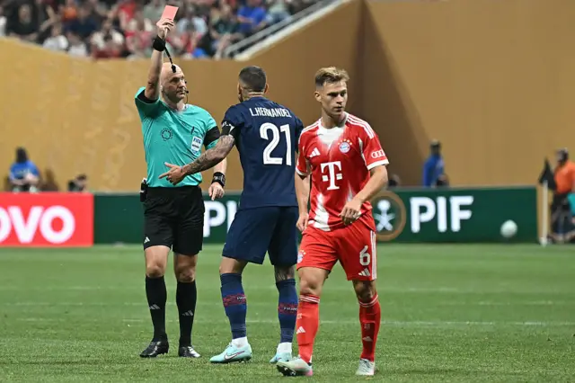 Anthony Taylor shows Lucas Hernandez a red card