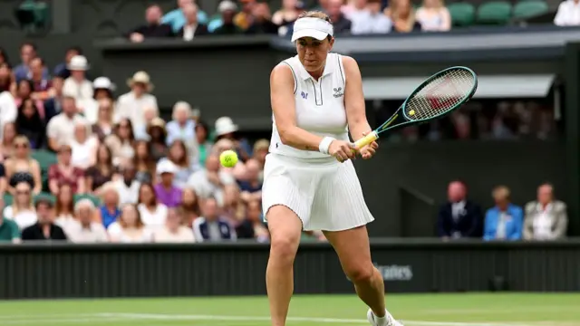 Anastasia Pavlyuchenkova plays a backhand drop shot