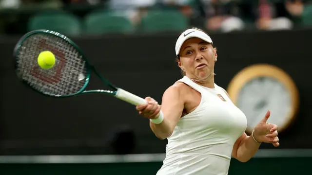 Amanda Anisimova of United States plays a forehand