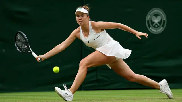 Linda Noskova of Czechia plays a forehand