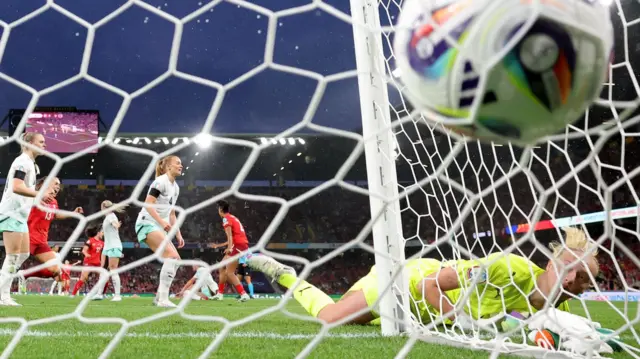 Iceland's Cecilia Runarsdottir looks dejected after Switzerland's Svenja Folmli scores their first goal before it is disallowed after a VAR review