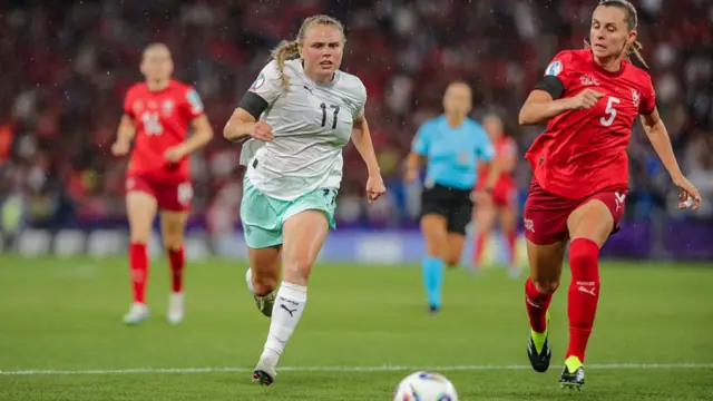 Agla Maria Albertsdottir of Iceland battles for possession with Noelle Maritz of Switzerland during the UEFA Women's EURO 2025 Group A match between Switzerland and Iceland at Stadion Wankdorf