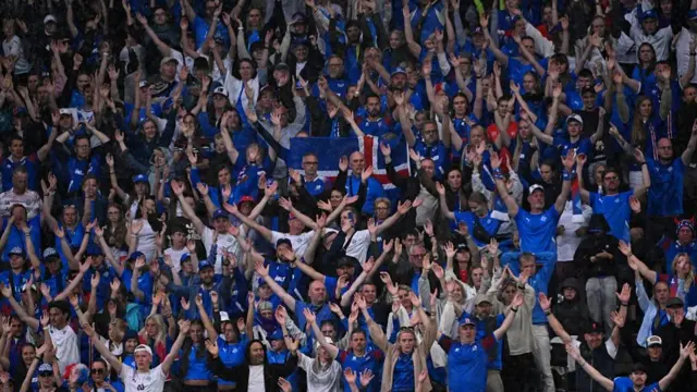 Iceland fans clap during the UEFA Women's Euro 2025 Group A football match between Switzerland and Iceland at the Wankdorf stadium in Bern,