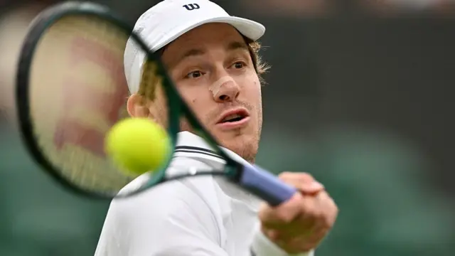 Nicolas Jarry plays a forehand return